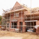 Building Site With House Under Construction